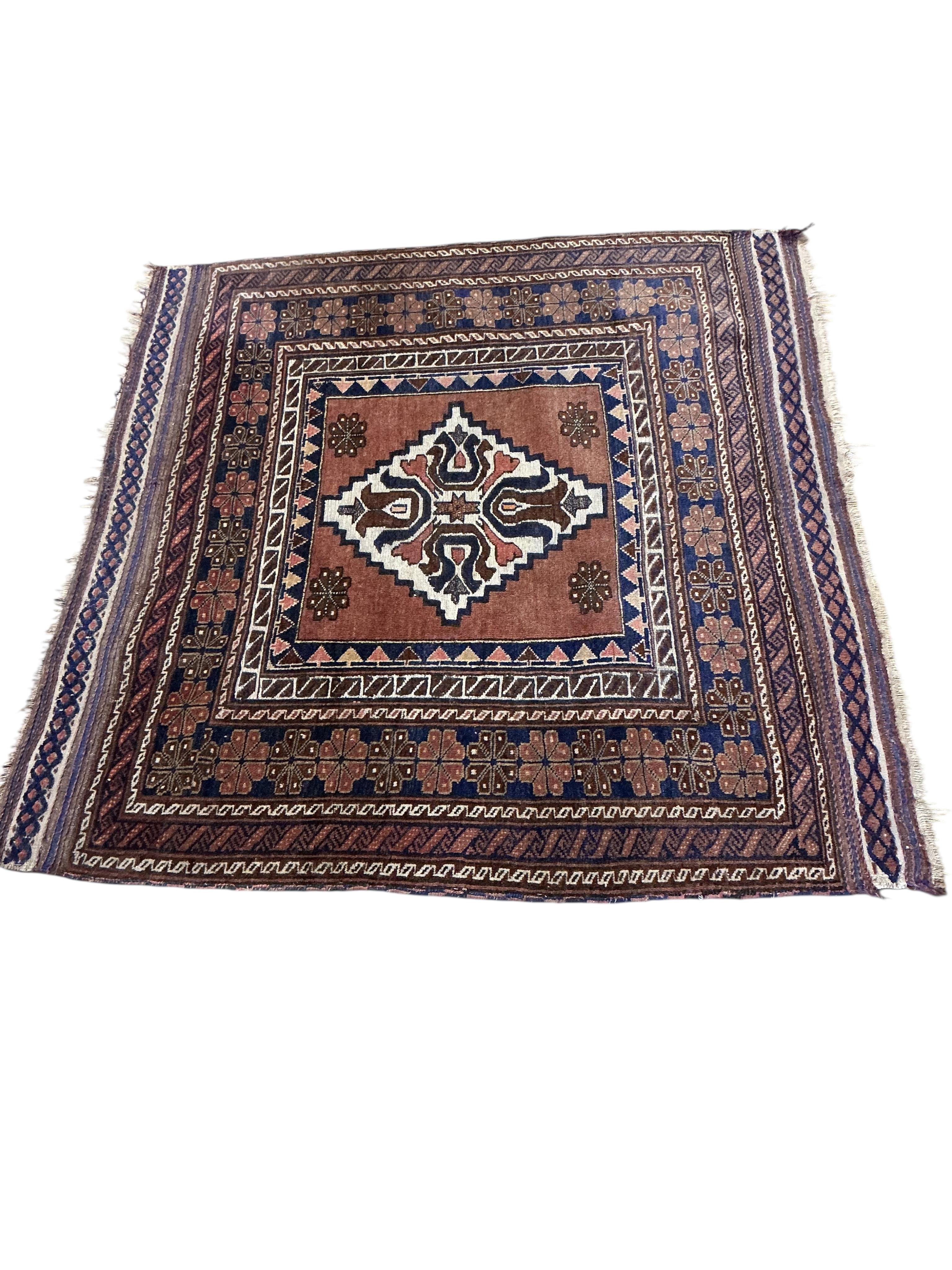 An Afghan red ground rug, a Kilim rug and a Caucasian rug, largest approx. 200 x 110cm